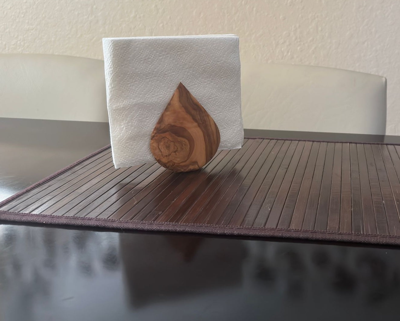 Top-angle view of the napkin holder showing its compact and elegant design