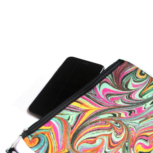 Ebru clutch with a black phone case on a white background