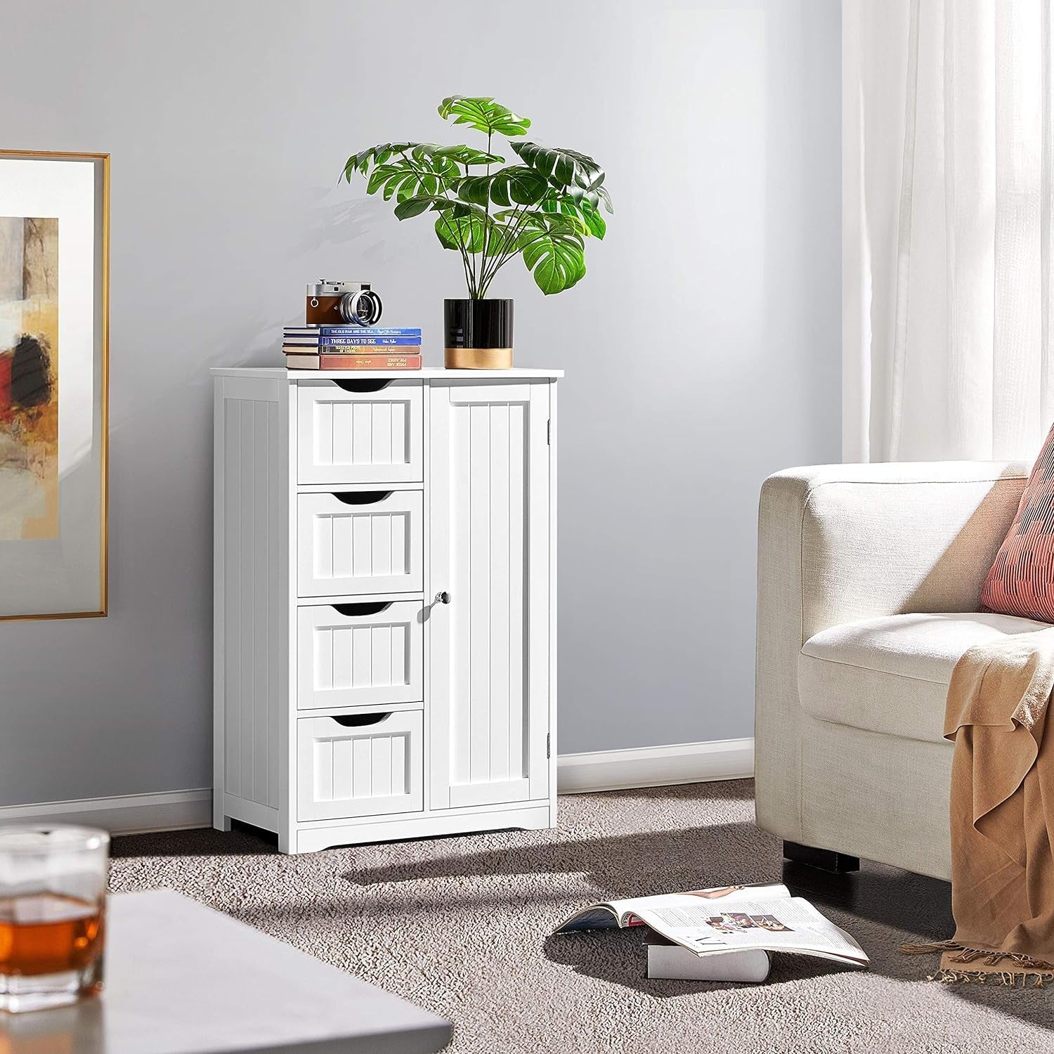 Side view of compact white entryway cabinet