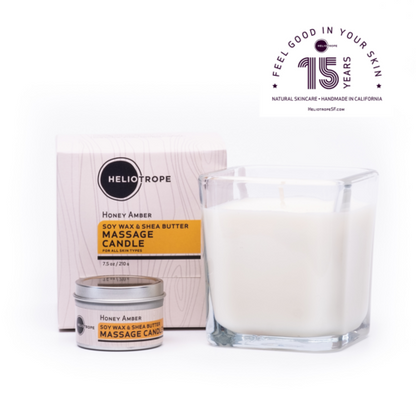 Heliotrope Honey Amber soy wax and shea butter massage candle with packaging on a white background
