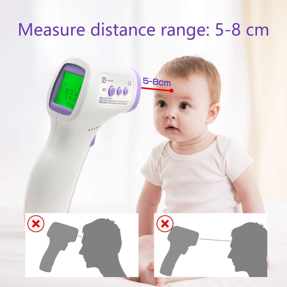 Infrared thermometer aimed at forehead for temperature reading from ideal distance of 2" to 3".