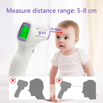 Infrared thermometer aimed at forehead for temperature reading from ideal distance of 2" to 3".