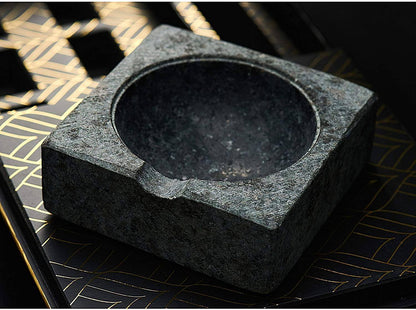 Handcrafted solid granite cigar ashtray close-up
