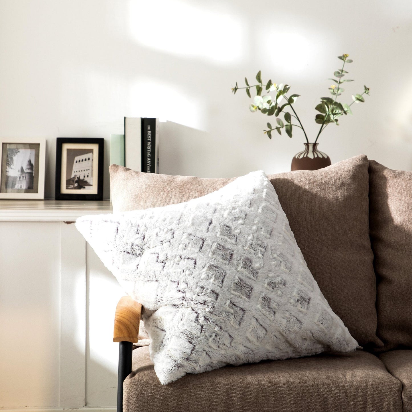 Dreamy Milky Way faux fur pillow cover styled on a cozy modern sofa