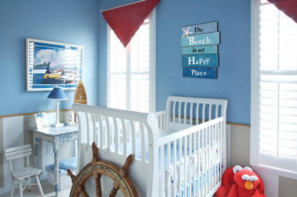 Coastal decorative sign styled with tropical accessories