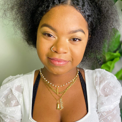 gold cowgirl boot jewelry displayed