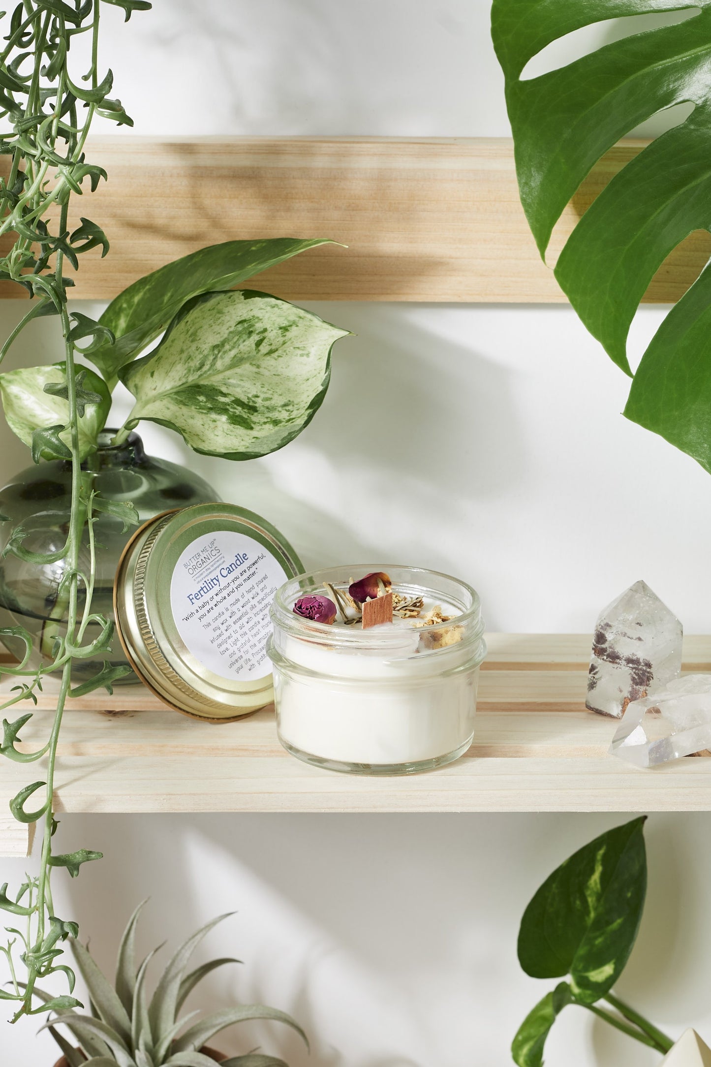 Krombee Bloom and Nurture Crystal Candle jar and lid on shelf