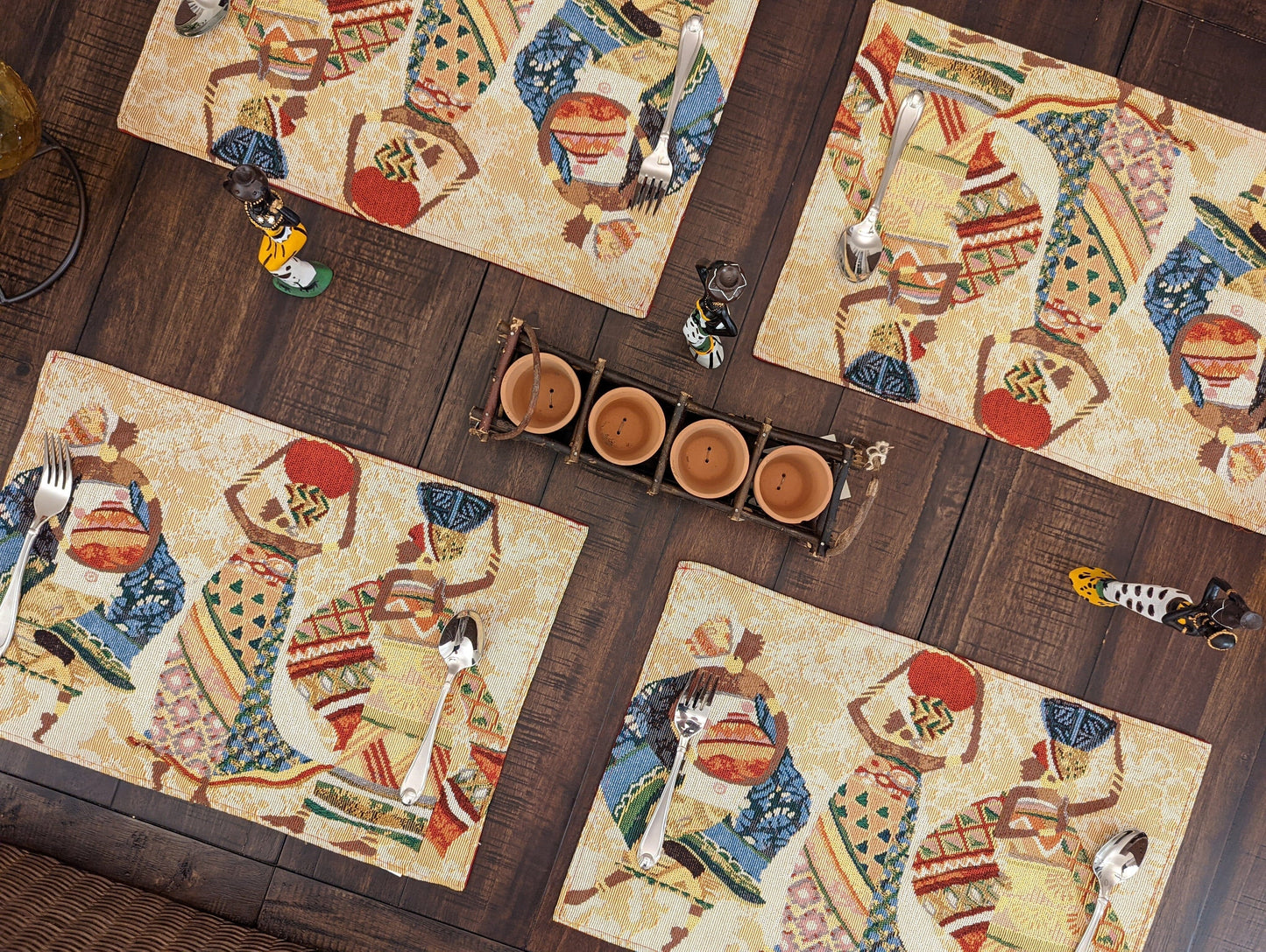 Set of four DaDa Bedding Kwanzaa Collection African Dreams woven placemats – tribal African art pattern for cultural dining décor.