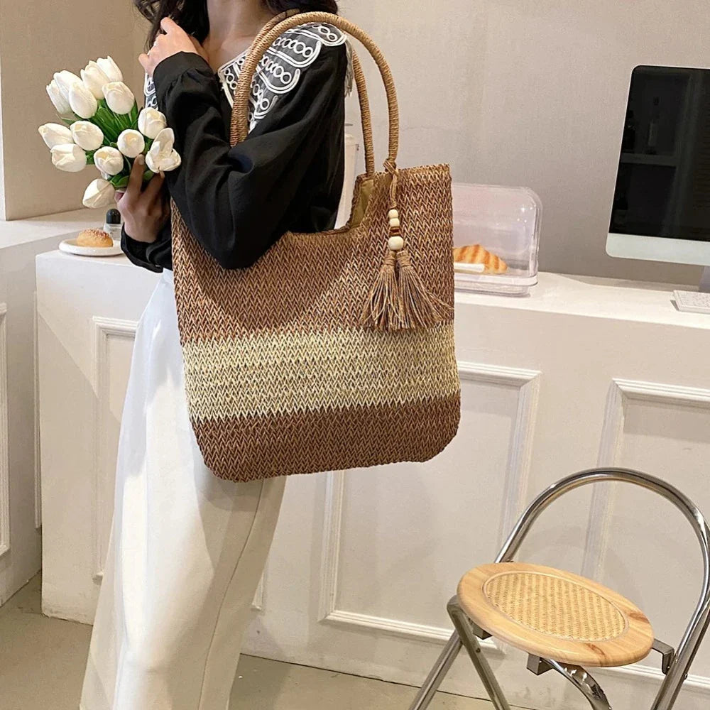 Woven beach tote with tassel detail