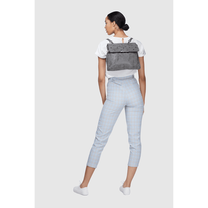 “Model wearing Siri Brown multiway vegan backpack as shoulder bag”