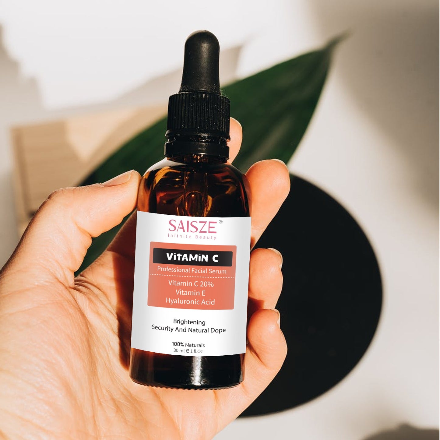 vitamin c serum bottle close-up in hand