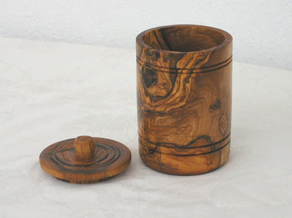 “Premium olive wood salt keeper showing rich natural grain for elegant kitchen styling.”