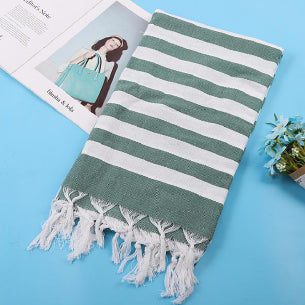 Folded artisan-made Turkish towel highlighting texture and colors