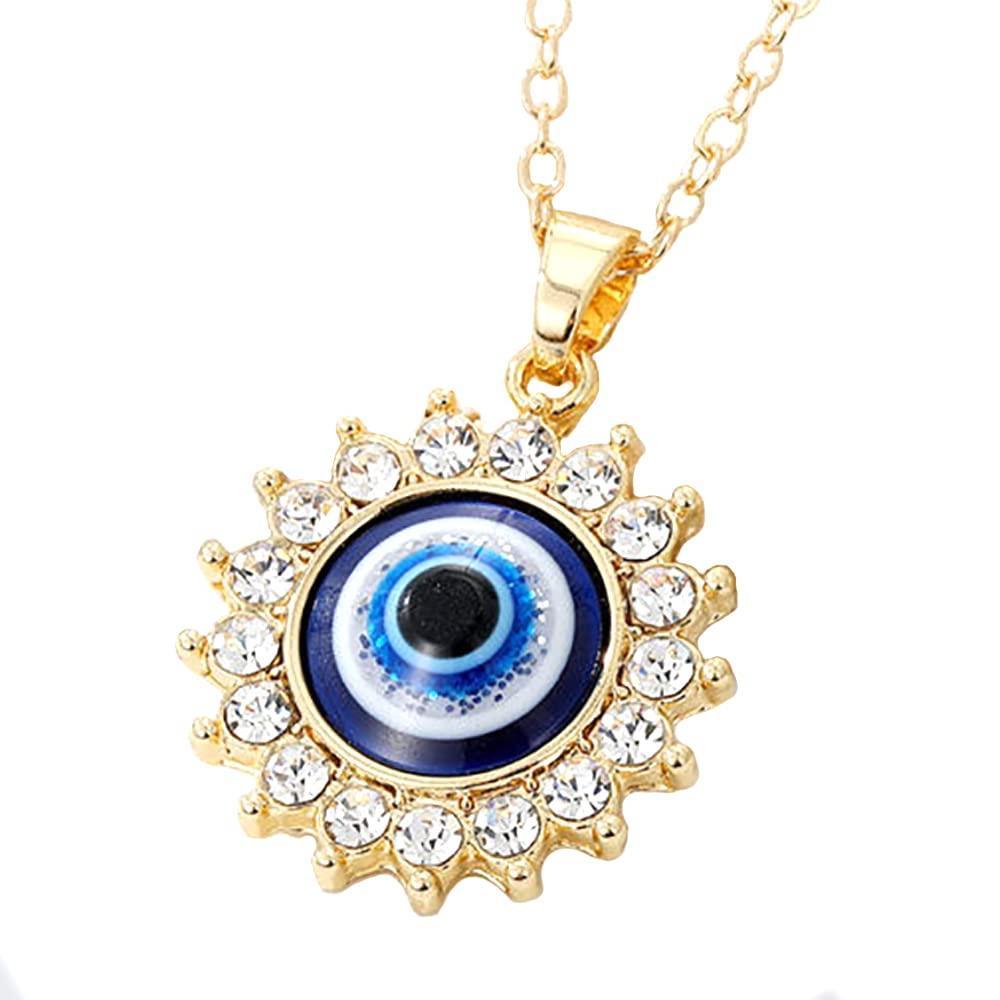 Gold evil eye necklace with cubic zirconia pendant close-up
