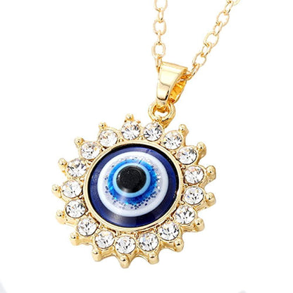 Gold evil eye necklace with cubic zirconia pendant close-up