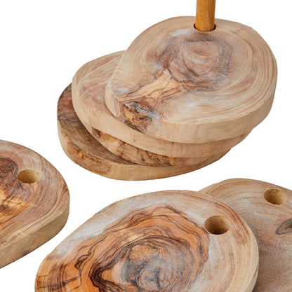 “Olive wood coaster set styled on a dining table for a warm, natural home aesthetic.”