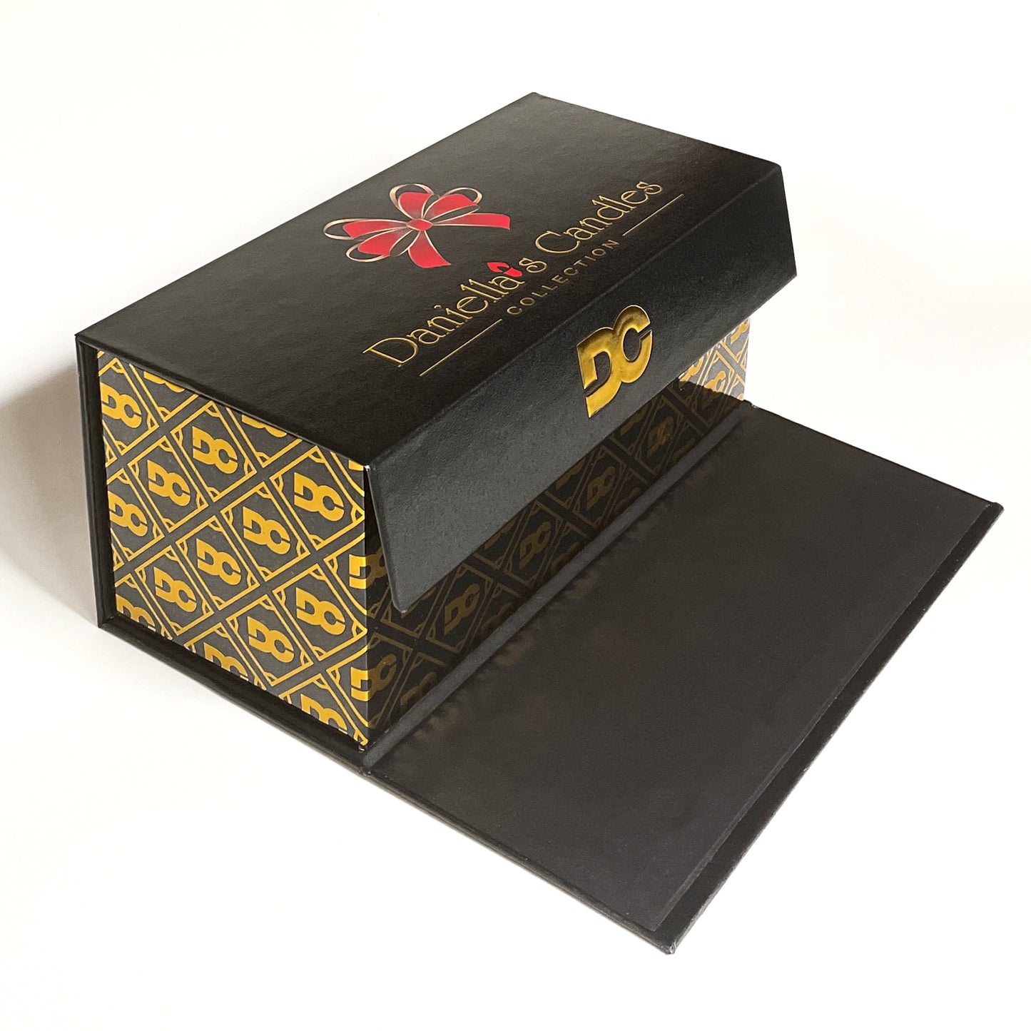 Black box with gold and red design featuring 'Danielle's Candles' logo on a white background