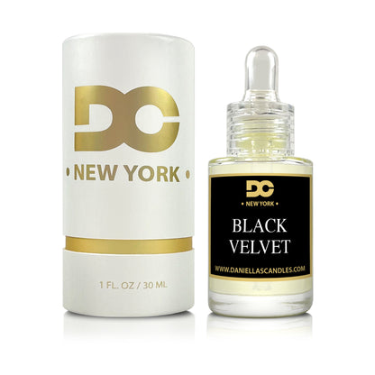 DC New York candle and Black Velvet perfume bottle on a white background