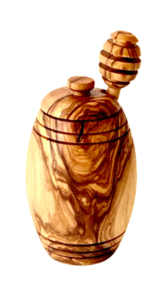 “Handcrafted olive wood honey pot with dipper showcasing natural grain and smooth polished finish.”