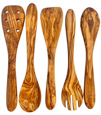 Close-up of polished olive wood grain on cooking spoon