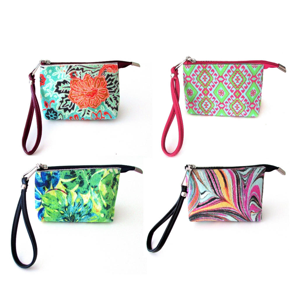 4 Patterns of wristlet vanity bags together