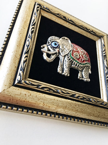 Red elephant and evil eye charm handmade wall art in framefrom another angle