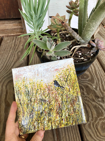 Artist-designed nature tile with sparrow