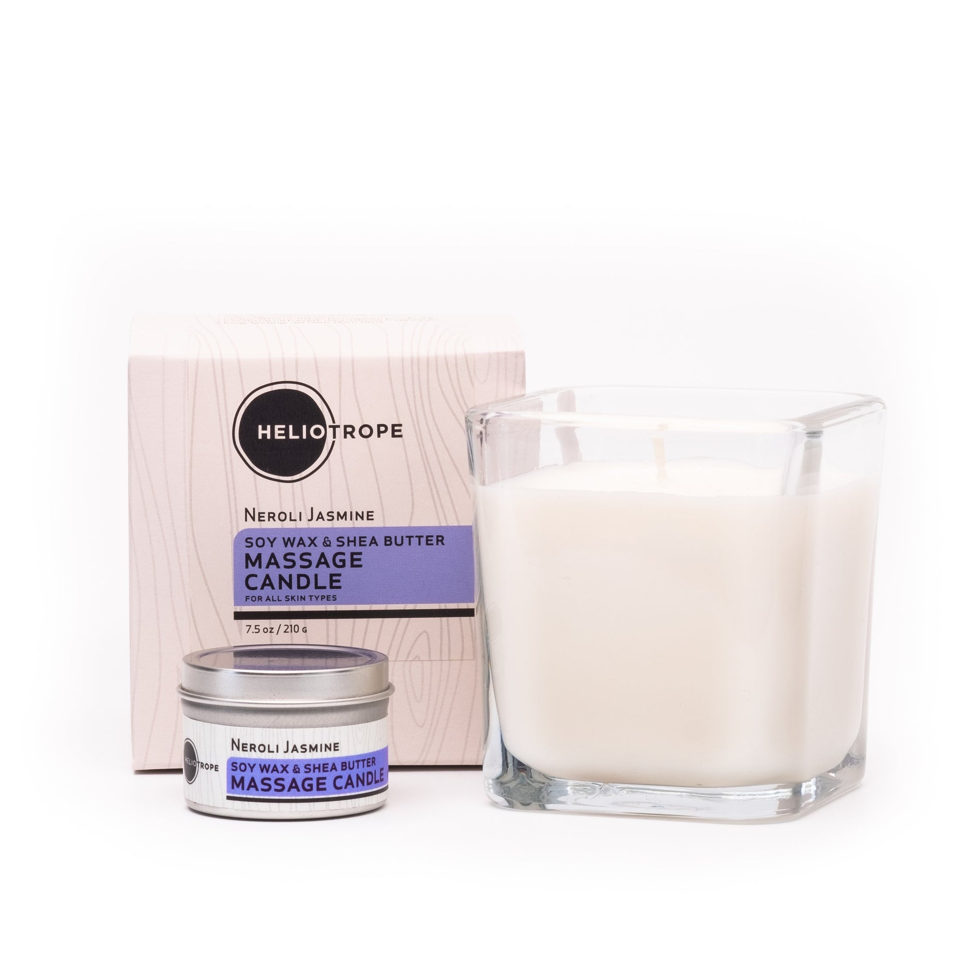 Massage candle and packaging with Heliotrope branding on a white background