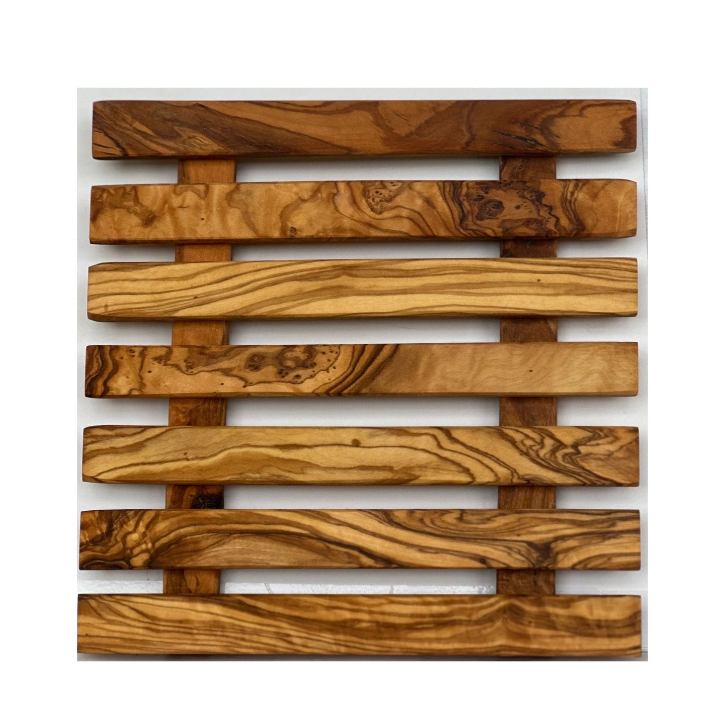“Handcrafted olive wood pan coaster showcasing rich natural grain for elegant kitchen styling.”