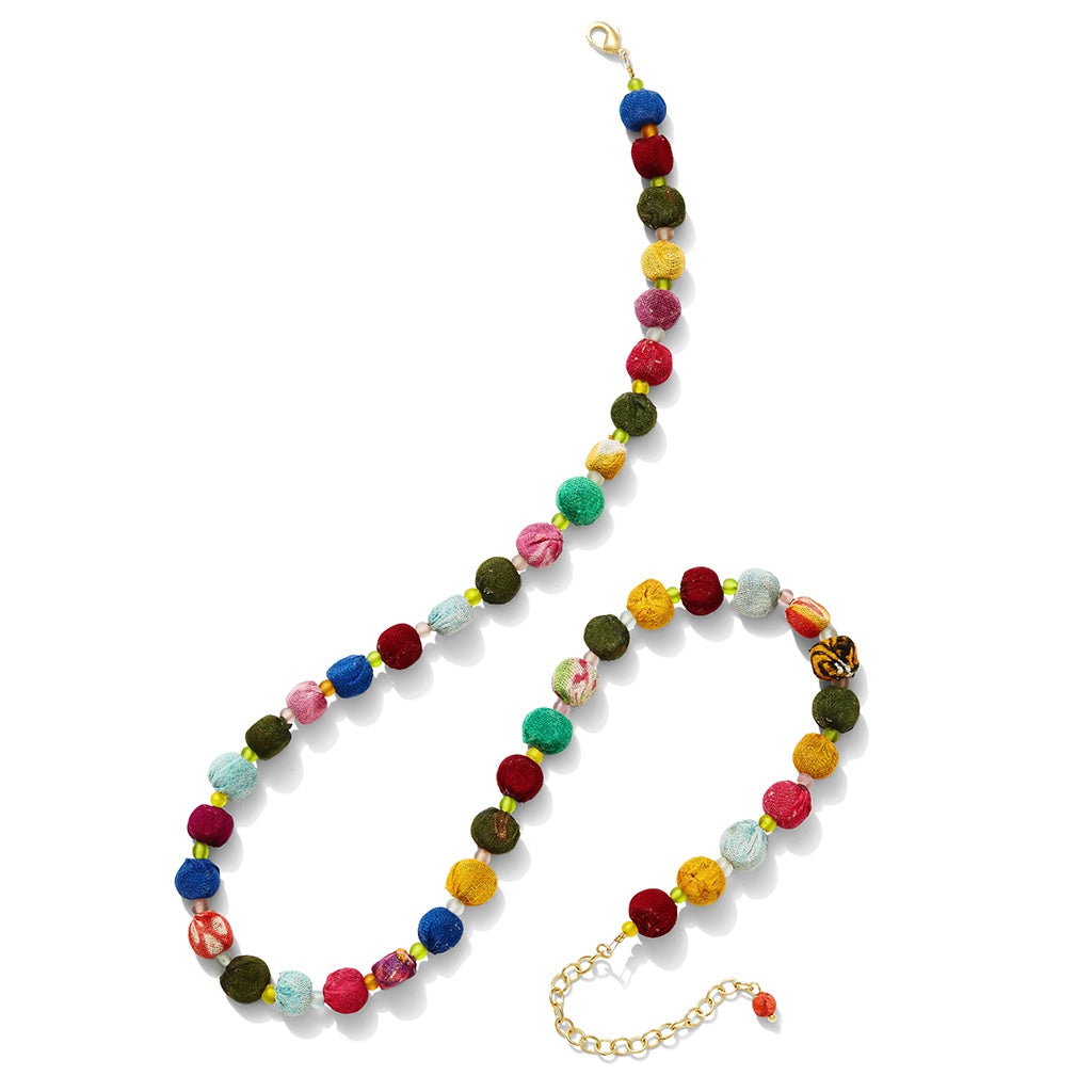 Open view of vibrant Kantha Bead Necklace showing multicolor textile beads made from upcycled cotton sari fabric