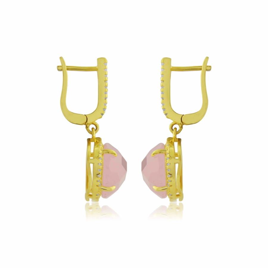 Close-up side angle of halo-set pink drop earrings