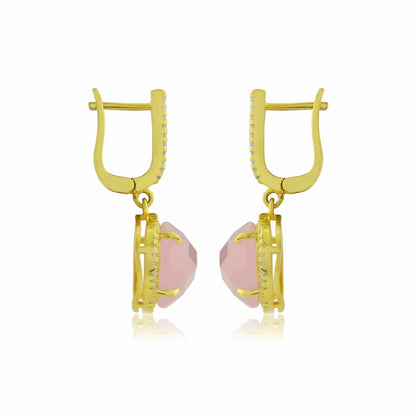 Close-up side angle of halo-set pink drop earrings
