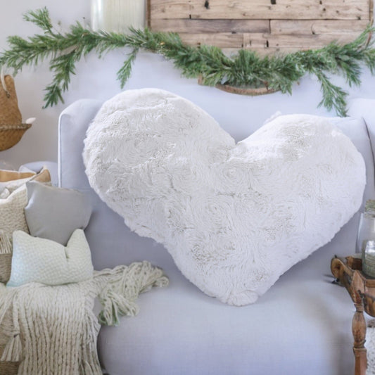 White faux fur heart-shaped pillow front view